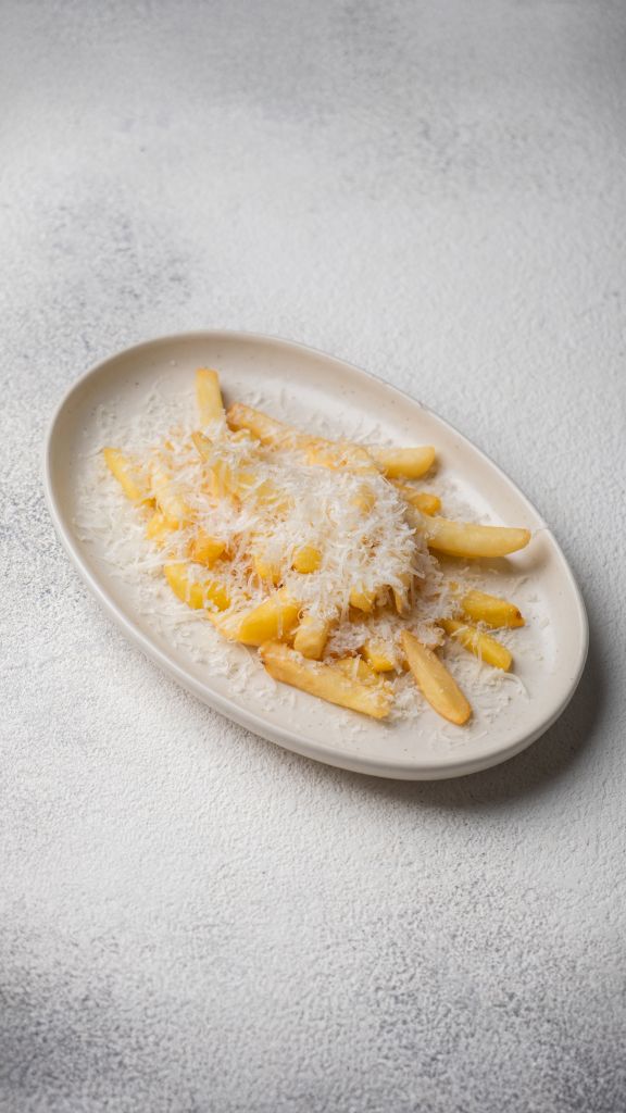 Картофель фри с пармезаном и трюфельным маслом